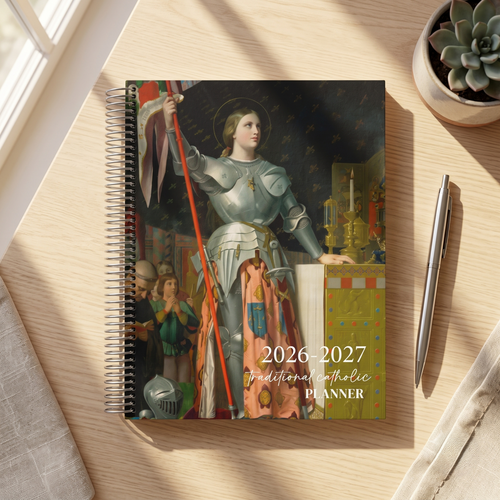 2026-2027 planner with a historical figure design on a wooden surface.